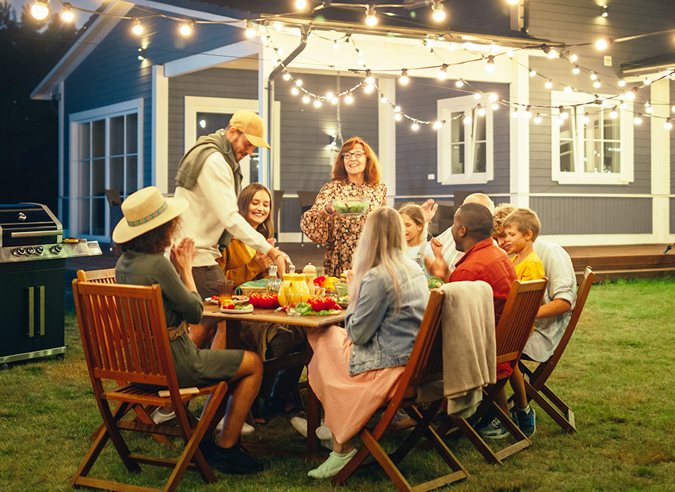 people sitting around table sharing a meal