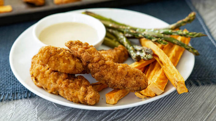 Chicken and Veggie Sheet-Pan Dinner with Tahini Dipping Sauce