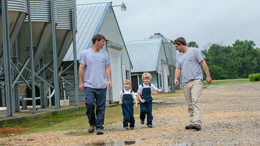 farmers and kids walking