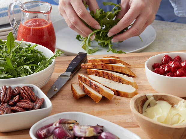 Step 4 Grilled Mojo Chicken Salad with Cherries, Manchego Cheese and Pecans Step 4