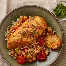 Moroccan Baked Chicken and Couscous with Tomatoes and Chickpeas