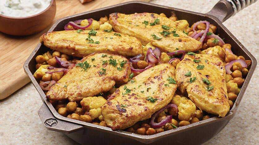 Ta Da Middle Eastern Skillet Chicken, Chickpeas, Red Onion and Cauliflower Served with Yogurt Cucumber Sauce Ta Da
