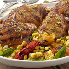 Grilled Coconut-Sazón Marinated Chicken Thighs with Corn Salad